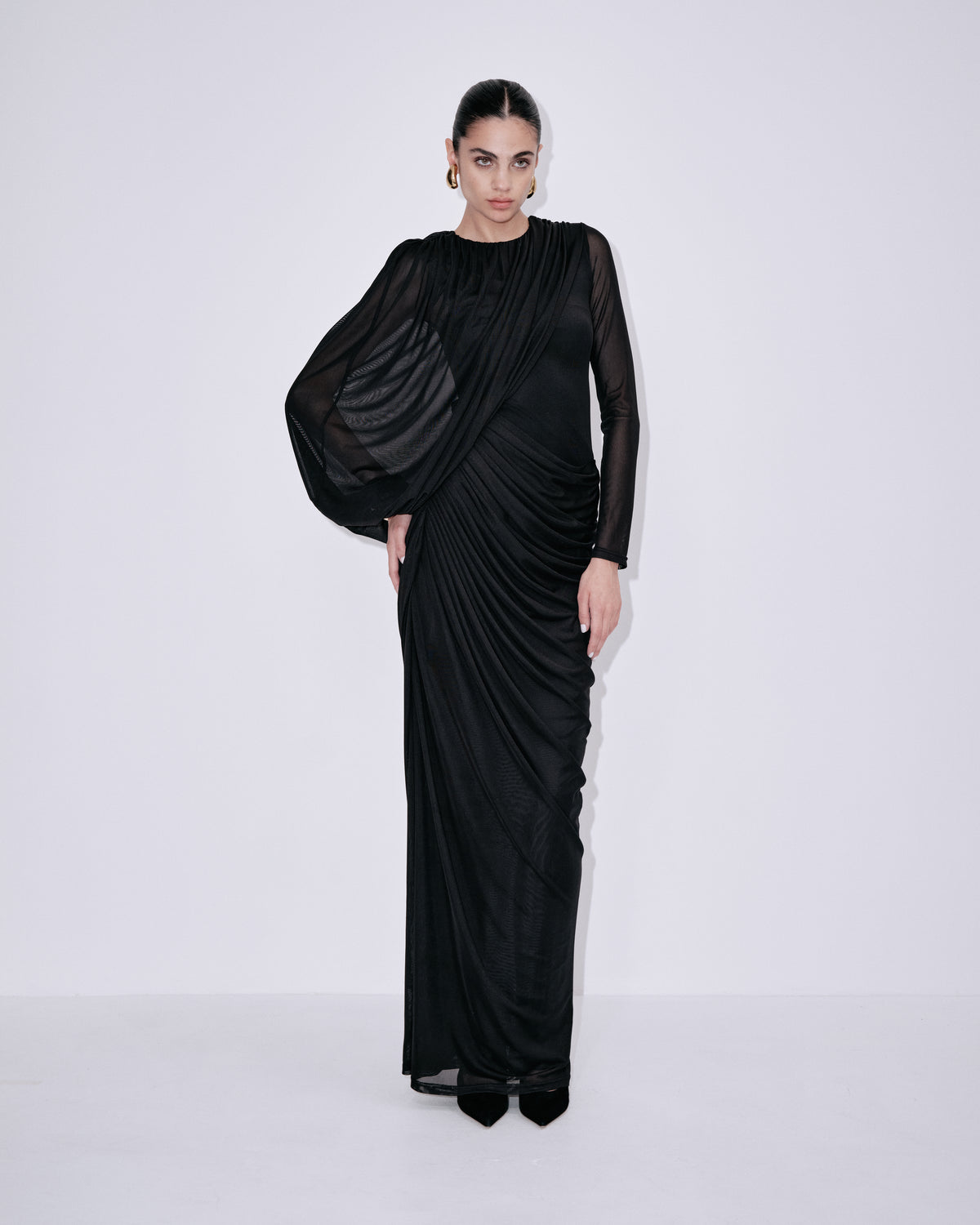Black draped long-sleeve maxi dress with wrap bodice and cowl neckline