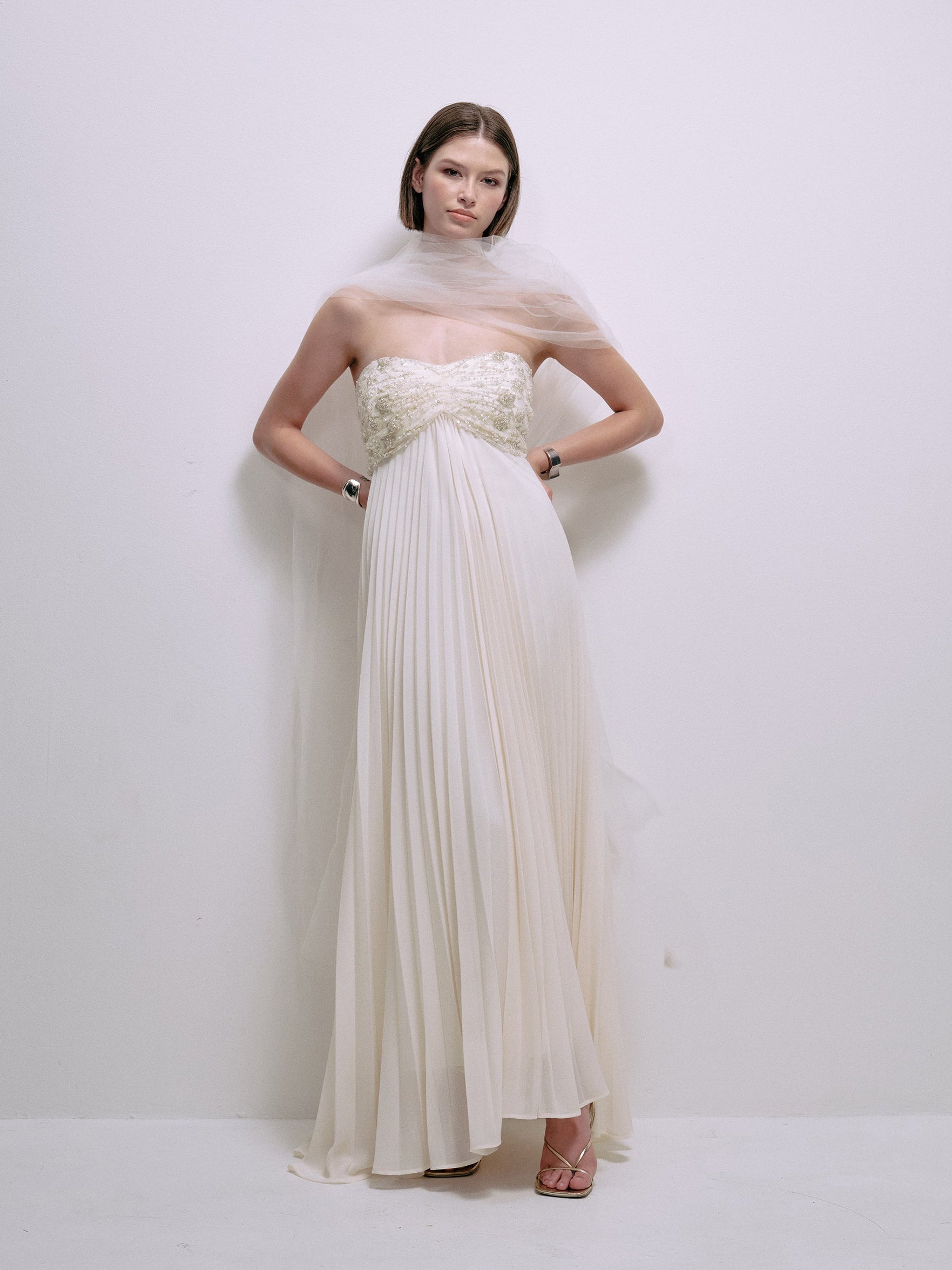 Cream strapless lace bodice maxi dress with pleated chiffon skirt