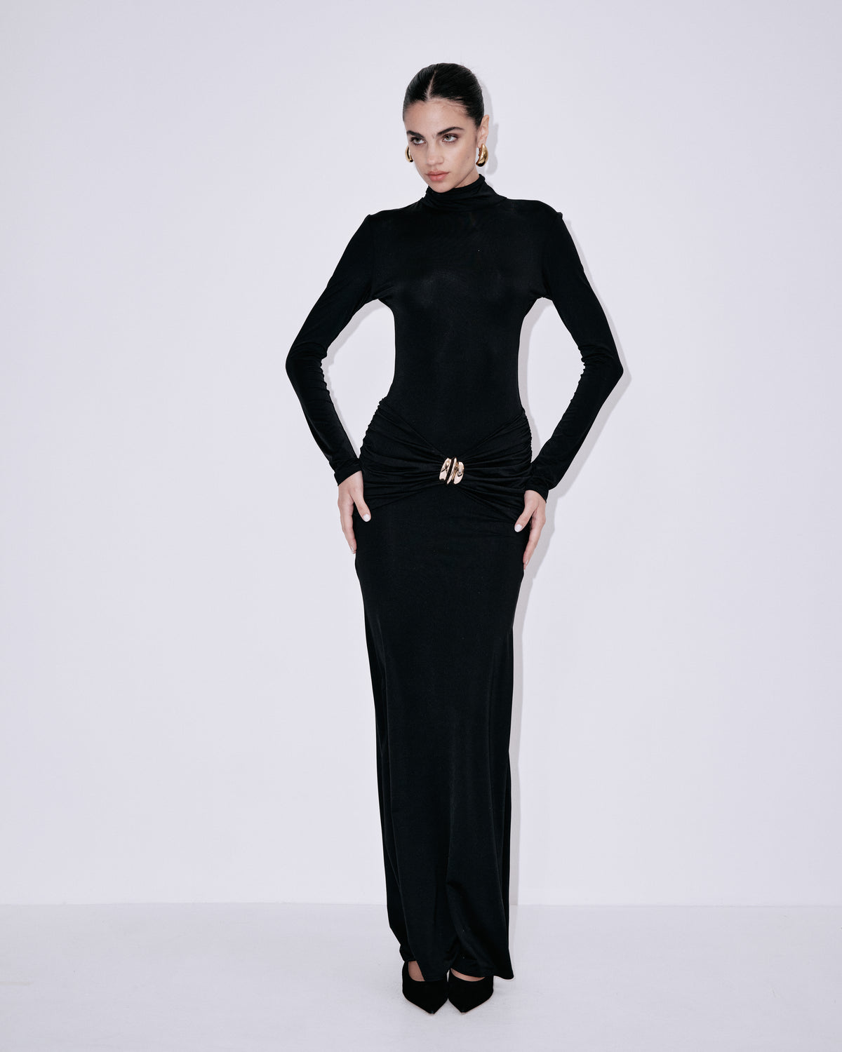 Black fitted turtleneck maxi dress with long sleeves and ruched waist detail