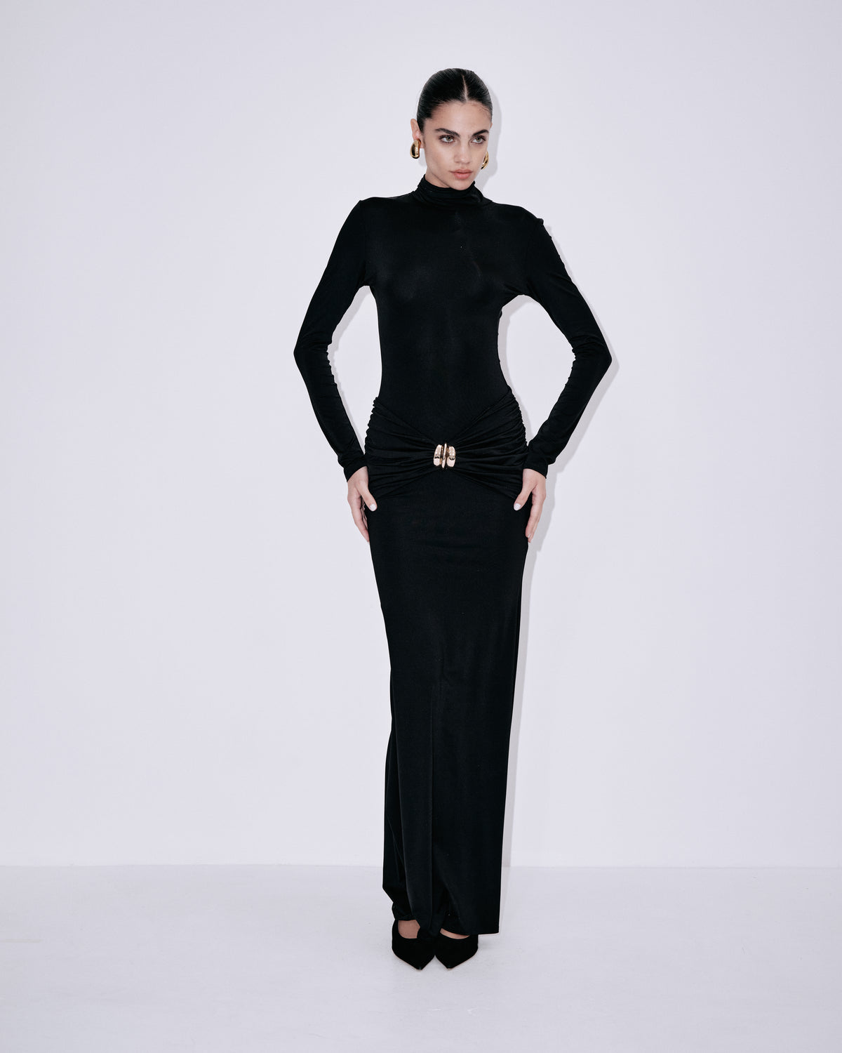 Black long-sleeve turtleneck maxi dress with ruched waist and side slit