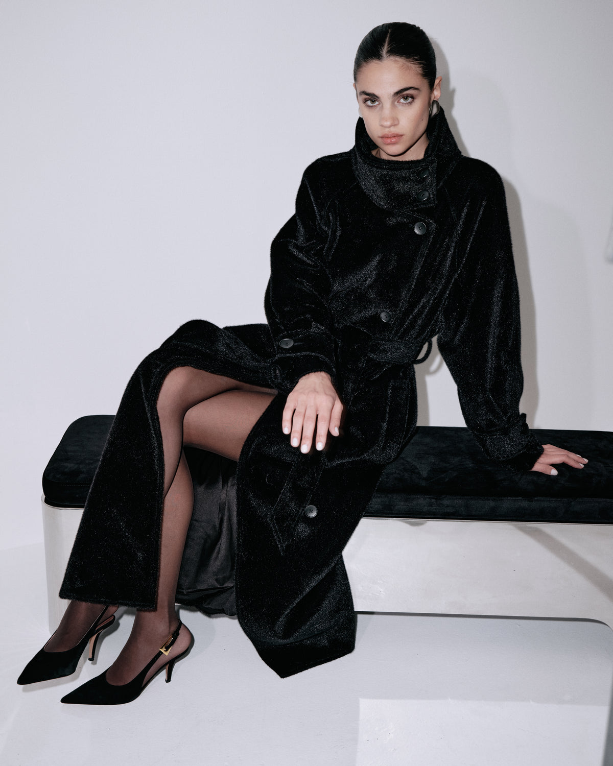 Black velvet long coat with high collar, button front, belted waist, side slit