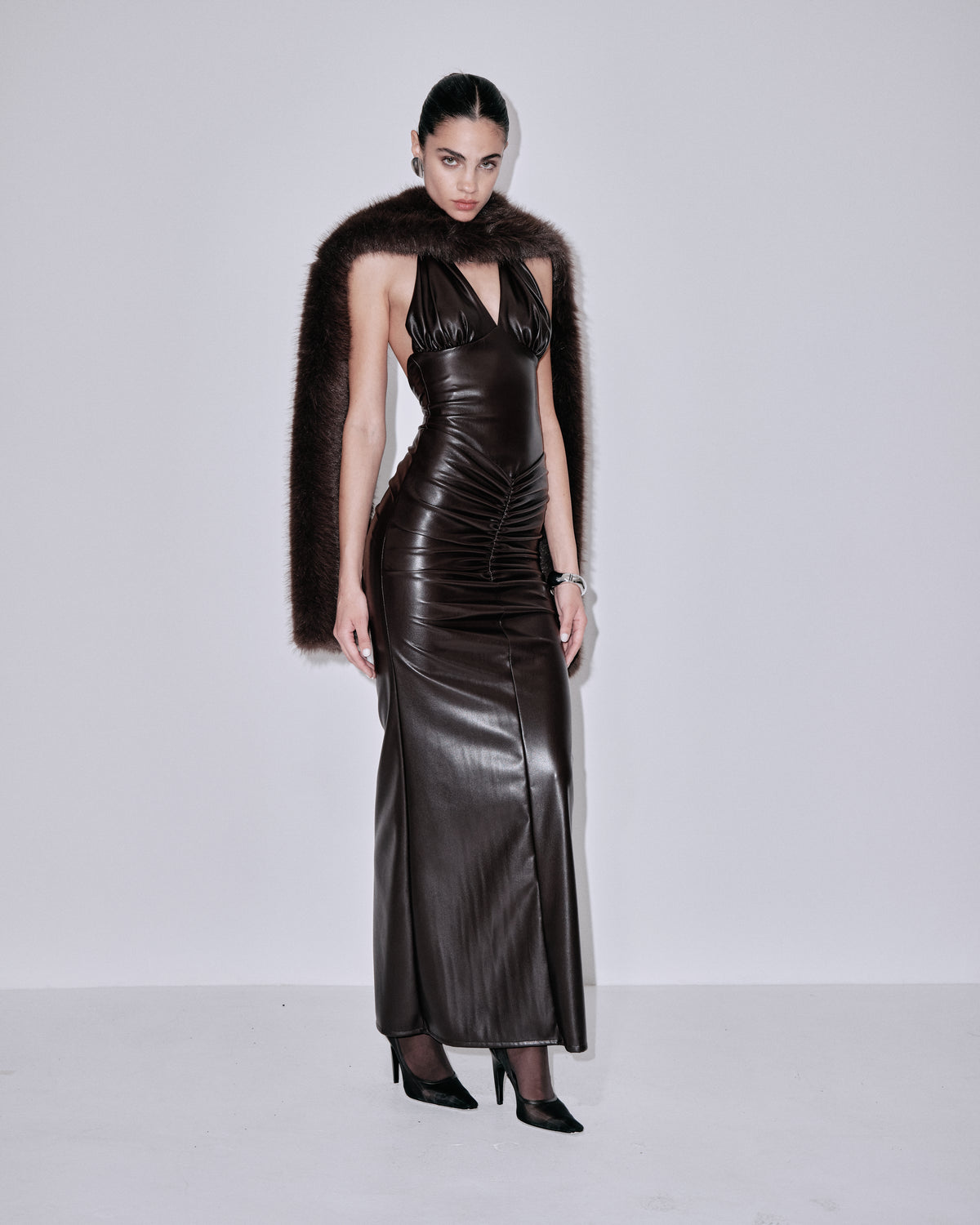 Chocolate fur scarf with shaggy texture, draped over shoulders