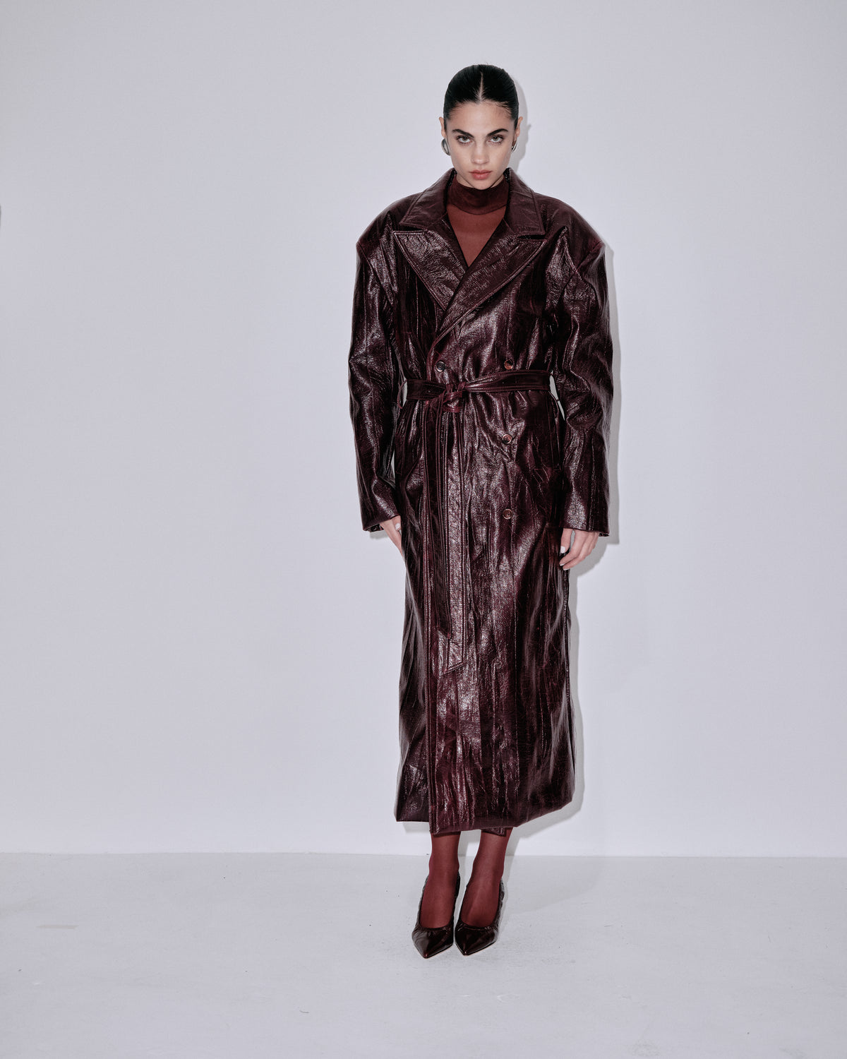 Metallic berry long coat with notched collar, tied waist belt, long sleeves