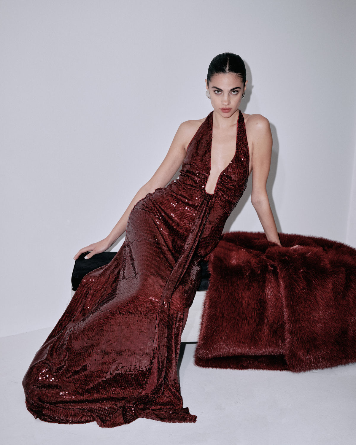 Wine sequin halter dress with faux-fur handbag-style accessory