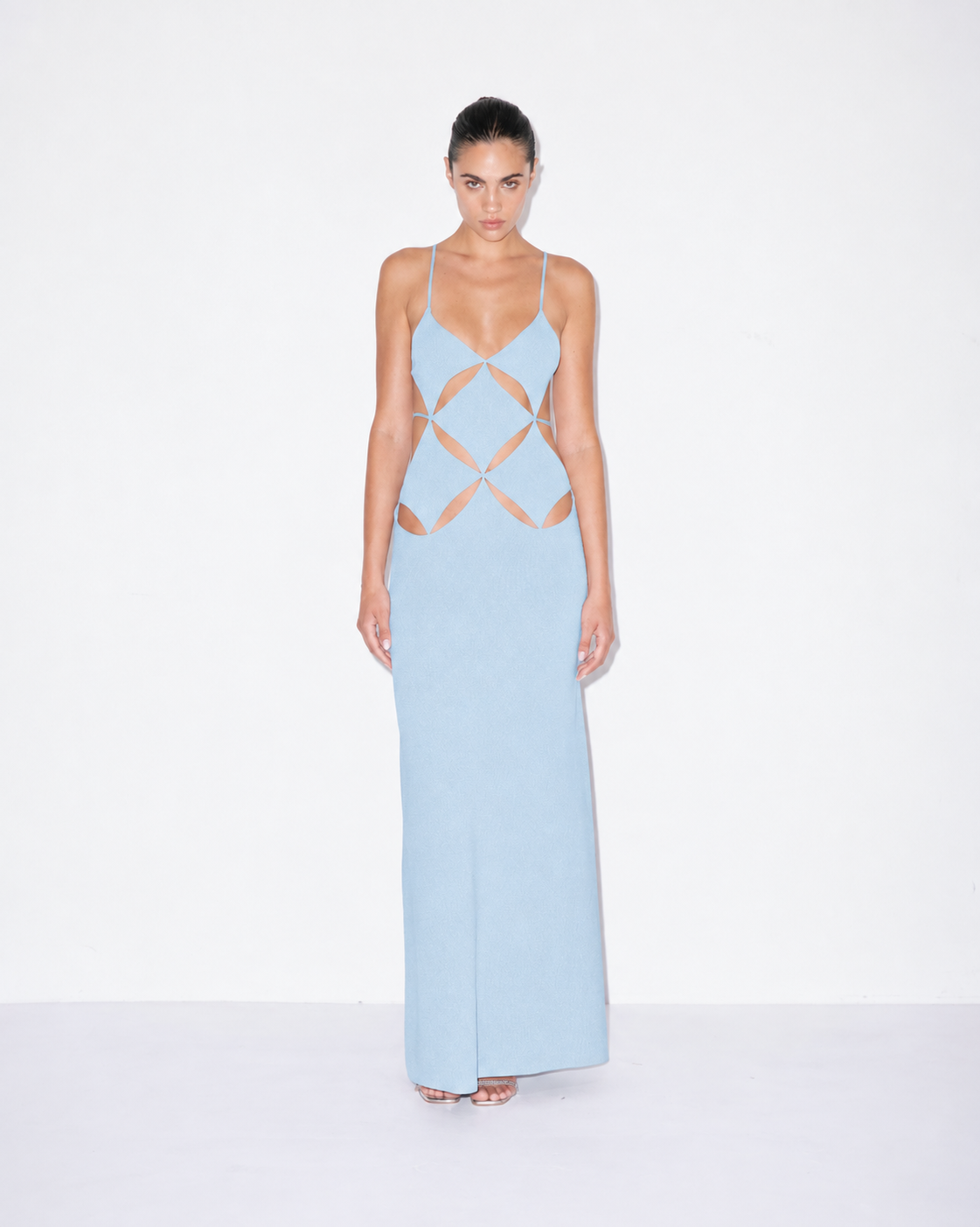 Light blue maxi dress front view, geometric cutouts, spaghetti straps, V neckline