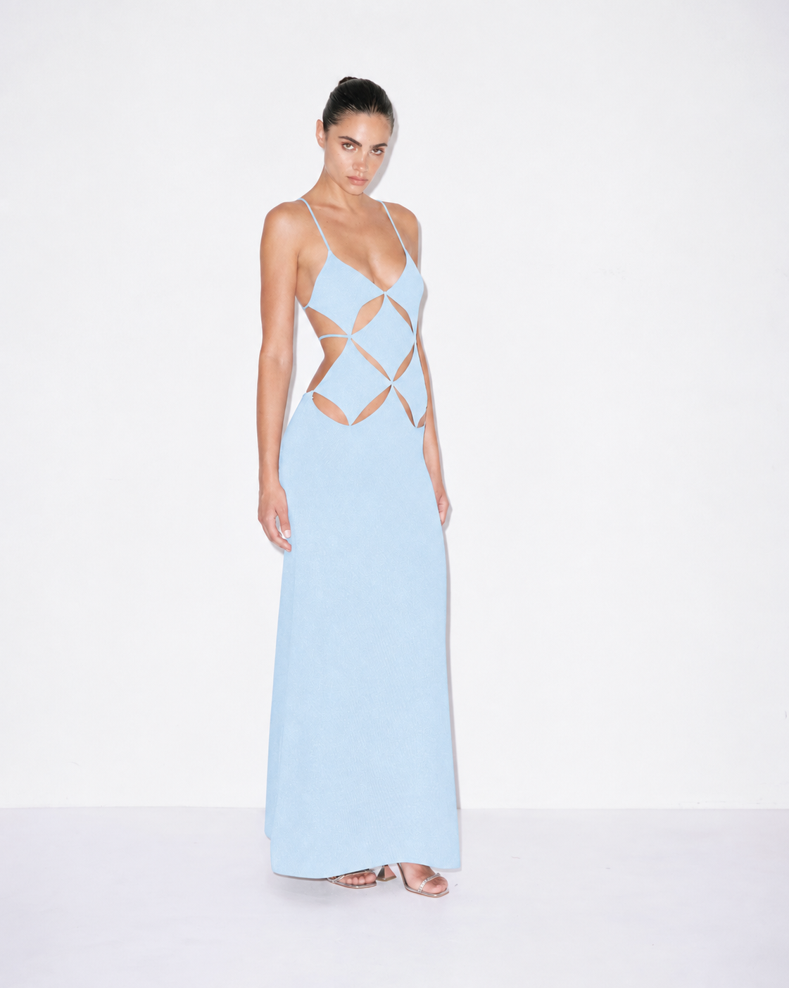 Light blue maxi dress angled view, geometric cutouts, spaghetti straps, V neckline